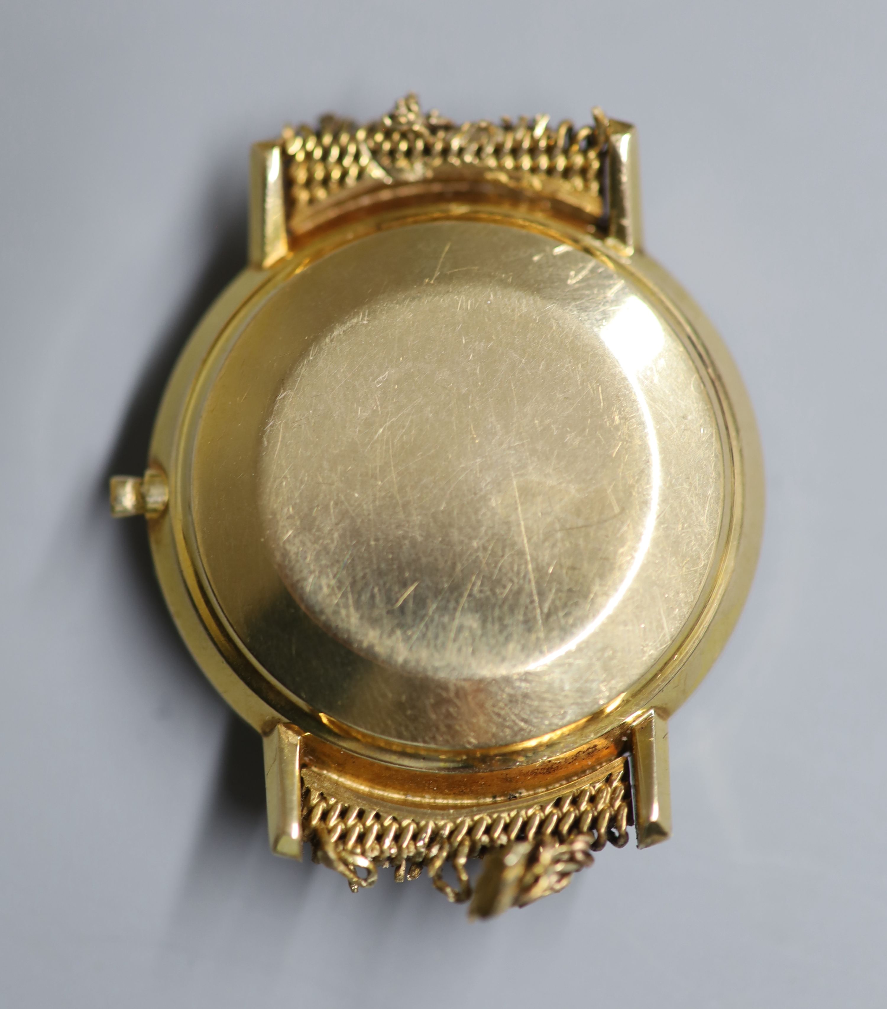 A gentlemans yellow metal Omega automatic wrist watch, now without bracelet and winding crown,